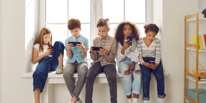 children playing with different devices