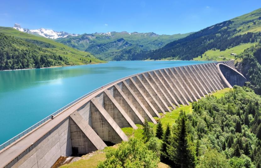 Creating Harmony. A dam in the middle of a green environment