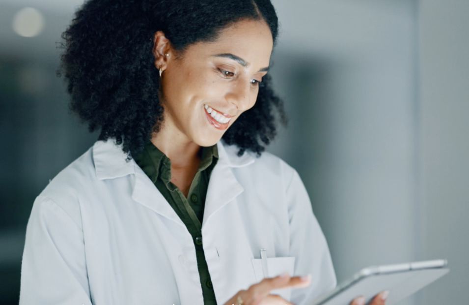 doctor checking information on a tablet