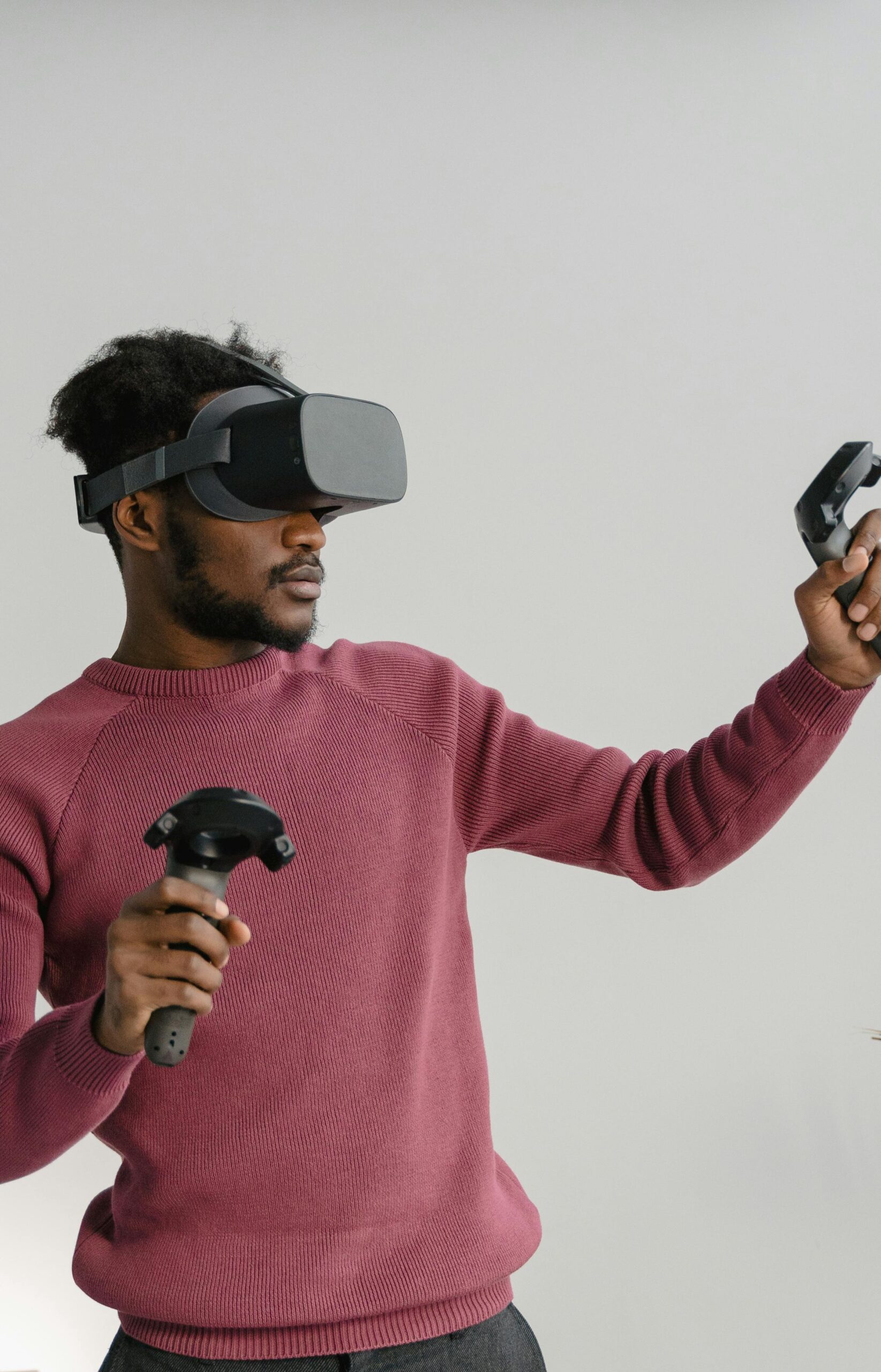 Black man wearing VR glasses