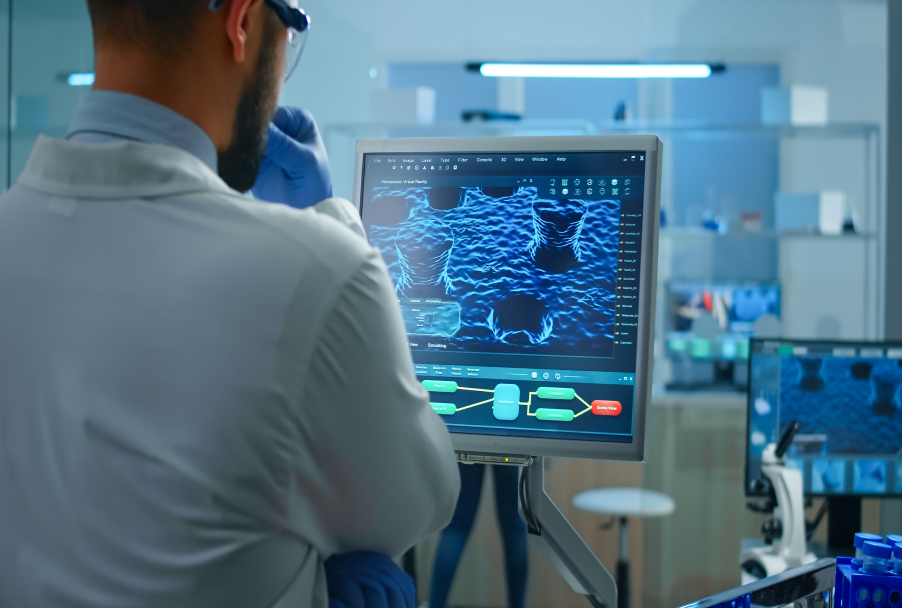 Scientist analyzing 3D material simulation in high-tech laboratory environment.