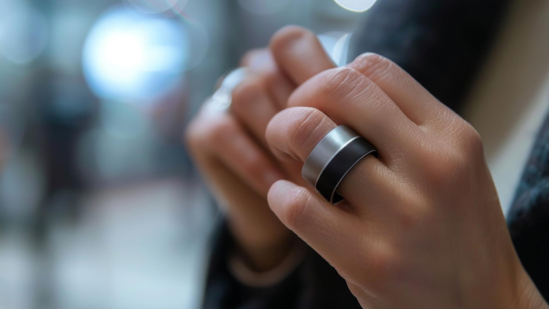 Closeup of a woman hands wearing a smart ring to monitor vital parameters