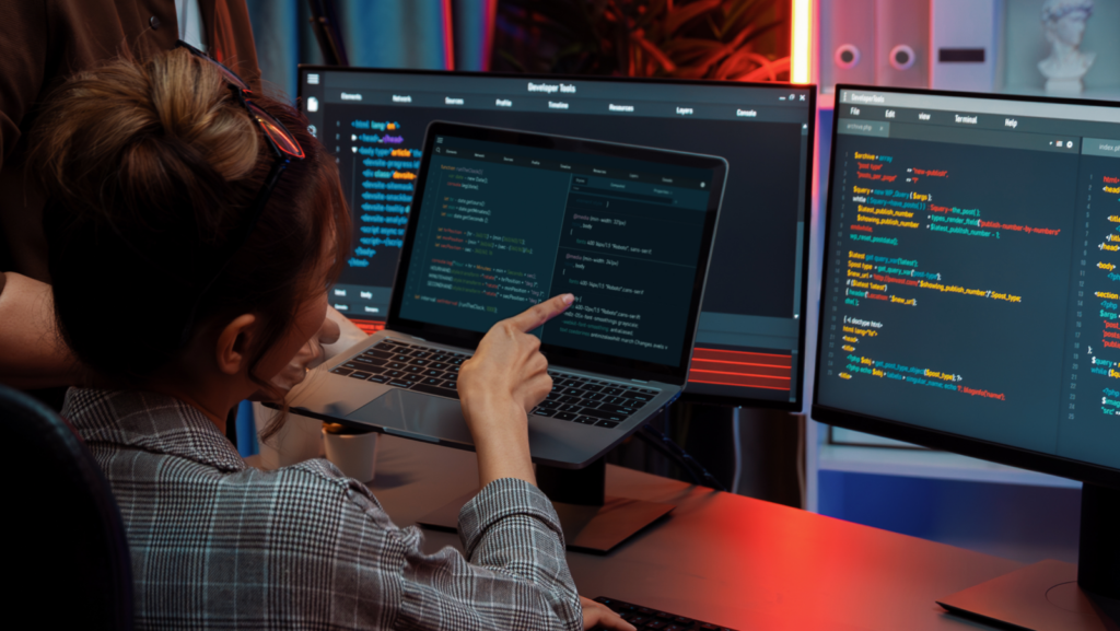 cybersecurity expert reviewing some code on her screen