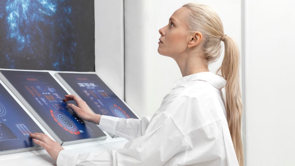 woman scientist interacting with a touchable screen