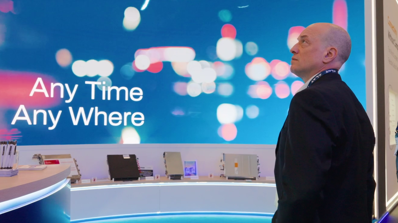 Sean Lawrence from NTT Inc at the IOWN Global Forum booth at MWC