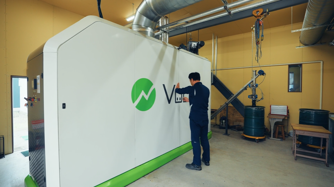man working in a biomass power plant