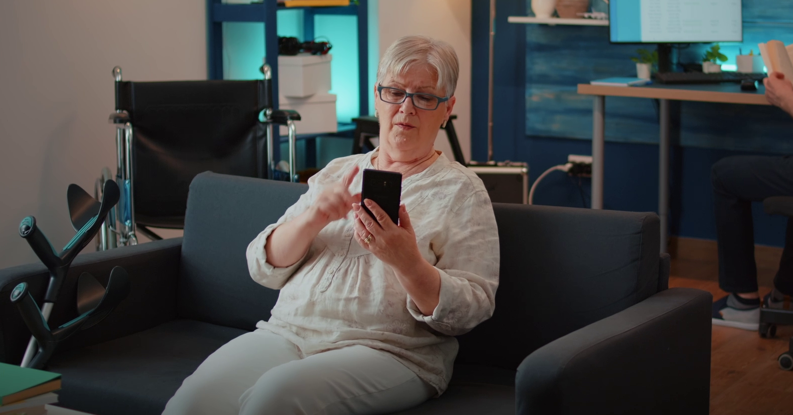 Elder woman checking her mobile phone