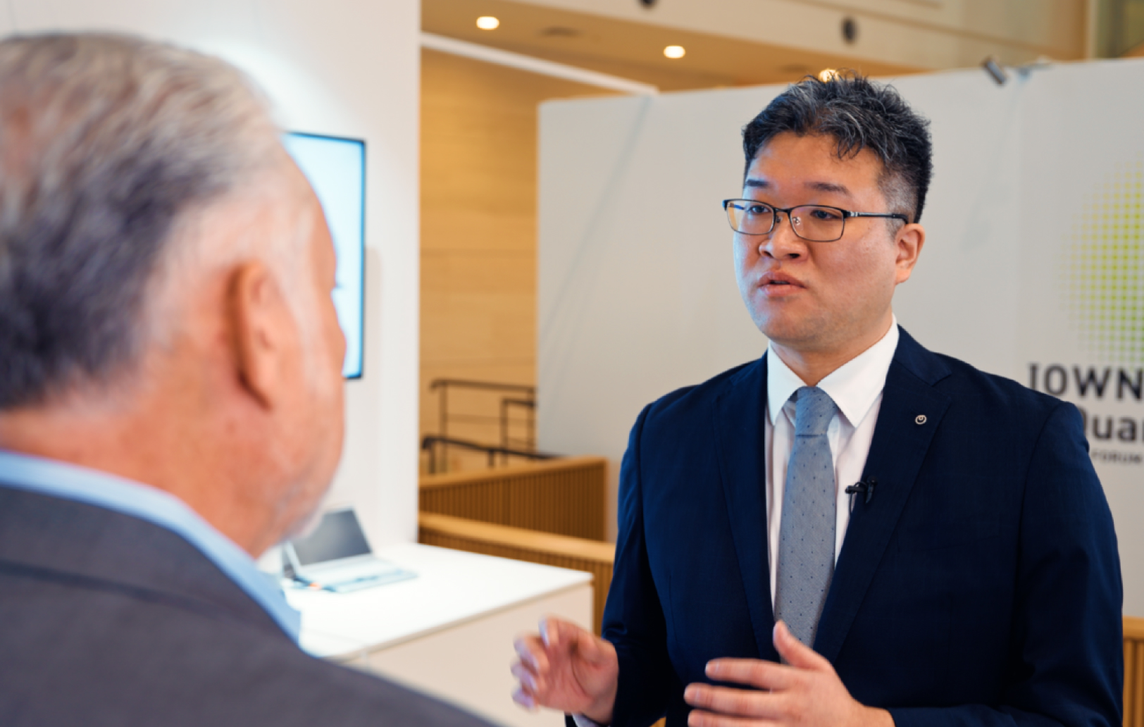 Dr. Kyosuke Nishida, Senior Distinguished Researcher, Human Informatics Laboratories, NTT, Inc. explaining how tsuzumi 2 works