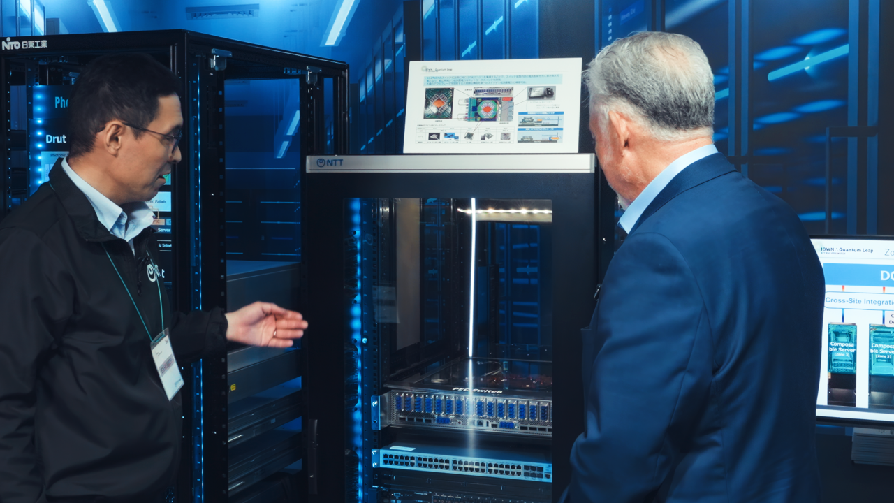 Dr. Norio Sato, group leader of the Device Innovation Center of NTT, explains the first hardware where optical engines are deployed in the server.